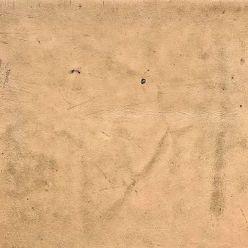Texture of old beige leather close up. Stock Photos