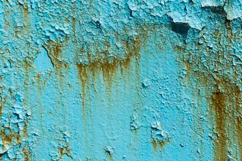 Texture of an old blue cracked wall with rusty stains. Stock Photos