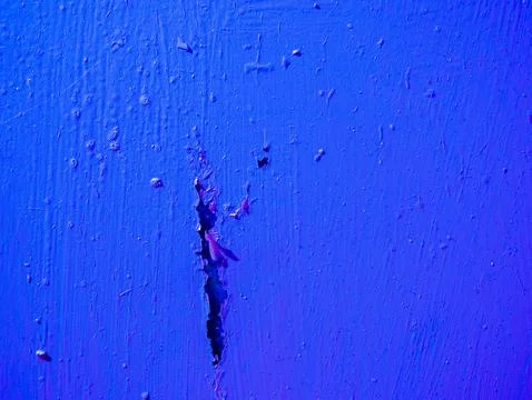 Texture of old blue damaged paint on the wall. Stock Photos