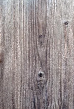 The texture of old boards with a natural pattern. Wooden background. Stock Photos