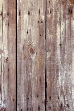 The texture of old boards with a natural pattern. Wooden background. Stock Photos