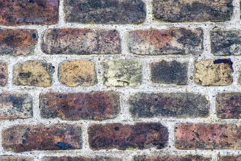 Texture of old brick wall of an ancient building. Red and orange masonry of.. Stock Photos