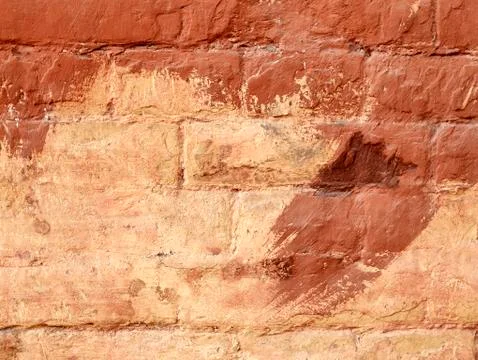 Texture of old brick wall painted brown in natural environment Stock Photos