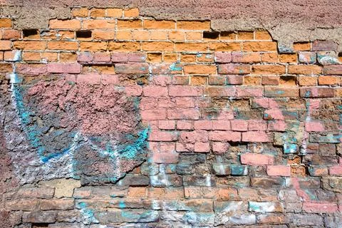 The texture of an old brick wall with plaster painted Stock Photos