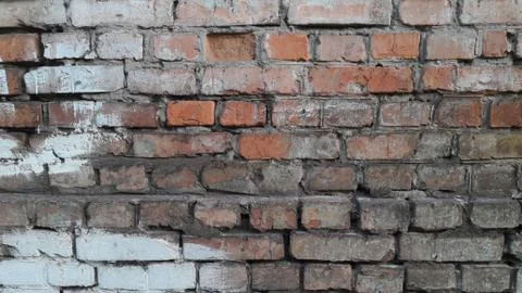 Texture of an old brickwork of a building wall 库存照片