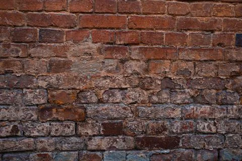 Texture of old brickwork with peeling color paint Stock Photos