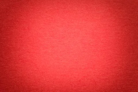 Texture of old bright red paper background, closeup. Structure of dense cardb 스톡 사진