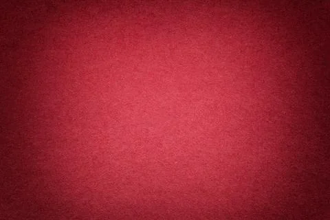 Texture of old bright red paper background, closeup. Structure of dense cardb 写真素材