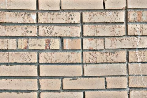 The texture of old broken bricks. Dirty brick walls from damage and smeared w 스톡 사진