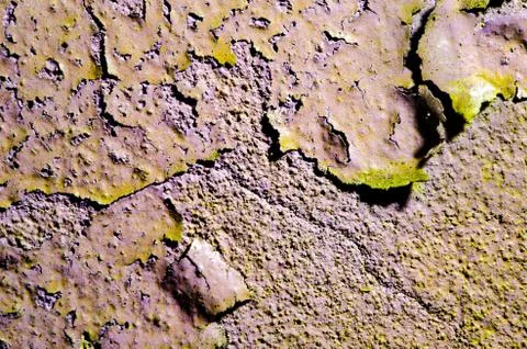 Texture of old broken wall with cracked paint surface. Stock Photos
