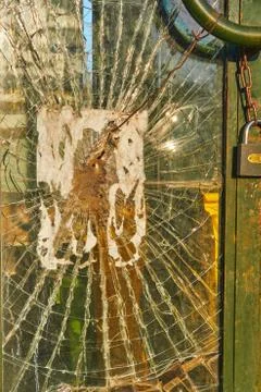 Texture old broken window with a greenish tint with a wooden frame Stock-Fotos