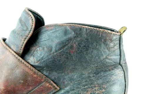 Texture in old brown leather boots on a white background. Foto stock