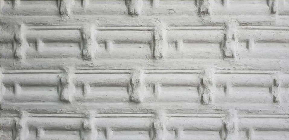 Texture of an old clay wall with a pattern Stock Photos