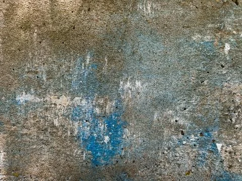 The texture of an old concrete wall, painted over with strokes of light bro.. Stock Photos