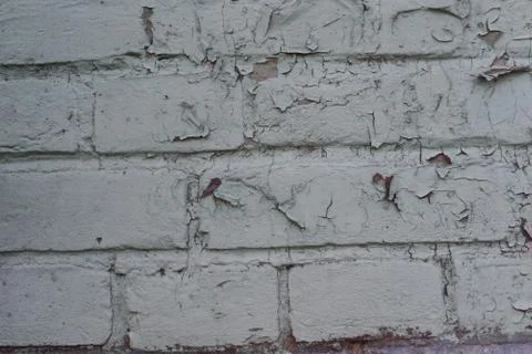 Texture: old cracked brick wall painted in paint. Brick wall texture. Stock Photos