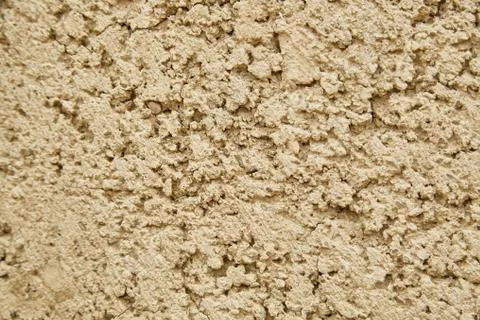 Texture of an old cracked sand wall background. Stock Photos