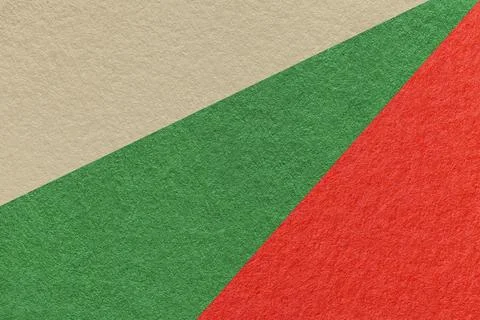 Texture of old craft beige, red and green color paper background, macro Foto stock