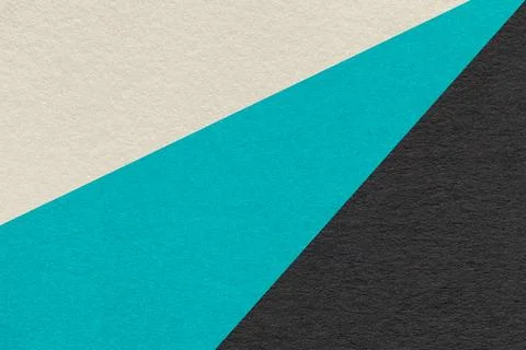 Texture of old craft beige, turquoise and black color paper background, macro Stockfoto's