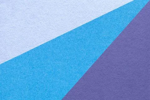 Texture of old craft blue, cerulean and violet color paper background, macro. Stockfoto's