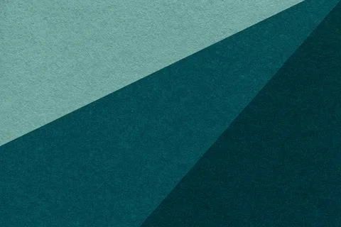 Texture of old craft cyan, emerald and teal color paper background, macro. Foto stock