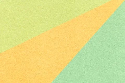 Texture of old craft light green, yellow and cyan color paper background, m.. Stock Illustration