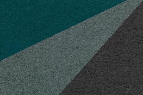 Texture of old craft teal, green and black color paper background, macro. Stock Photos
