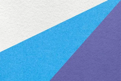 Texture of old craft white, blue and violet color paper background, macro. Stock Photos