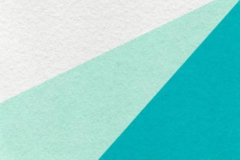 Texture of old craft white, mint and turquoise color paper background, macro. Stock Photos
