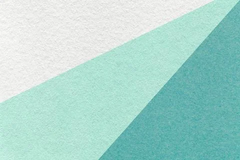 Texture of old craft white, mint and turquoise color paper background, macro. Stock Photos
