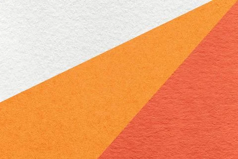 Texture of old craft white, orange and red color paper background, macro Stock Photos