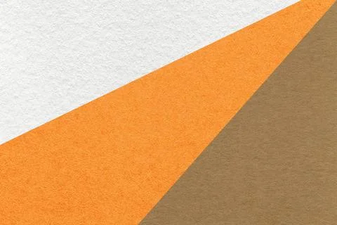 Texture of old craft white, orange and brown color paper background, macro Stock Photos