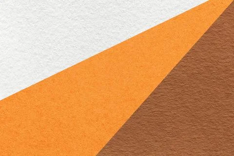 Texture of old craft white, orange and umber color paper background, macro Stock Photos