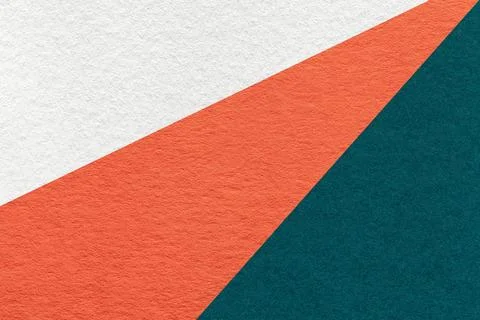 Texture of old craft white, orange and emerald color paper background, macro Stockfoto's