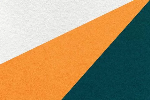 Texture of old craft white, orange and emerald paper background, macro Stock Photos
