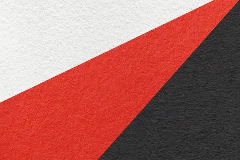 Texture of old craft white, red and black color paper background, macro. Foto stock