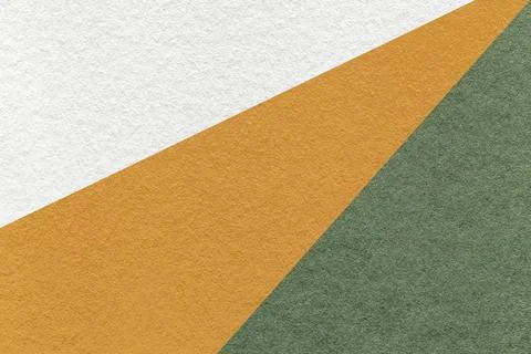 Texture of old craft white, yellow and green color paper background, macro. 写真素材