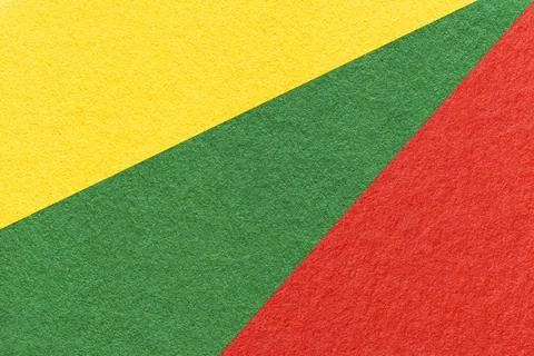 Texture of old craft yellow, red and green color paper background, macro Stock Photos