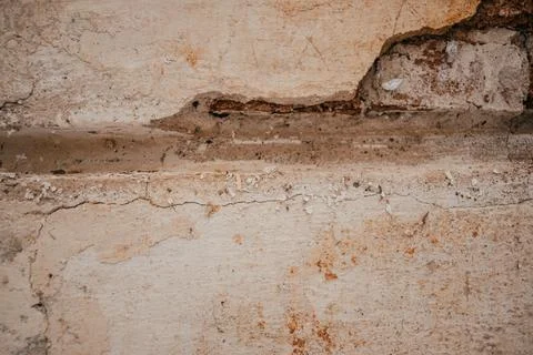 Texture of old crumbling cement wall close up Stock Photos