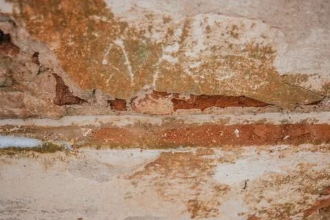 Texture of old crumbling cement wall close up Stock Photos