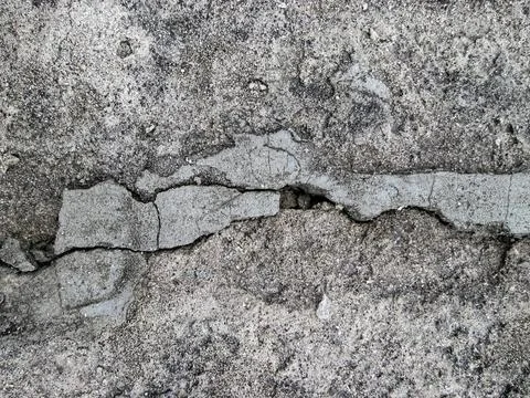 The texture of the old destroyed concrete. A battered floor in a warehouse Stock Illustration