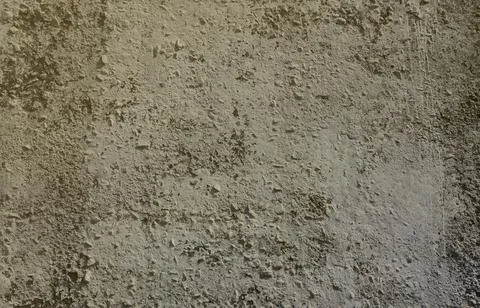 Texture of the old embossed concrete wall in gray color. Background image of a Stock Photos