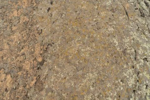 Texture of old granite covered with moss. Creative vintage background. Stock Photos