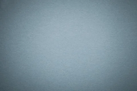 Texture of old gray paper background, closeup. Structure of dense light blue  Stock Photos