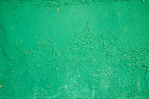 The texture of an old green painted wall. rough background. Stock Photos