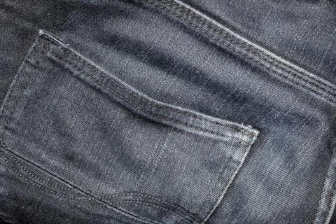 Texture the old jeans. Stock Photos