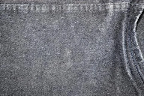 Texture the old jeans. Stock Photos
