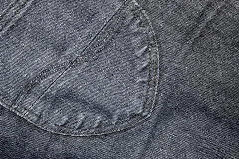 Texture the old jeans. Stock Photos