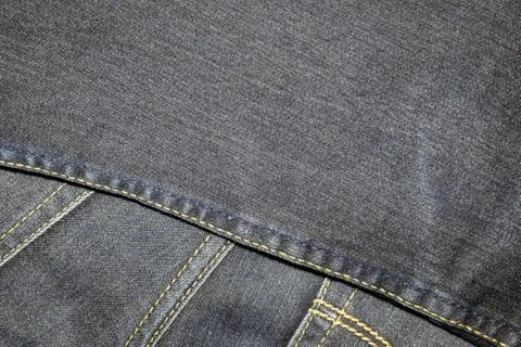 Texture the old jeans. Stock Photos