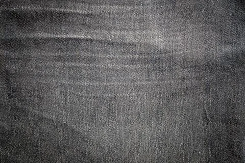 Texture the old jeans. Stock Photos