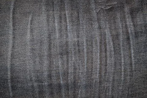 Texture the old jeans. Stock Photos
